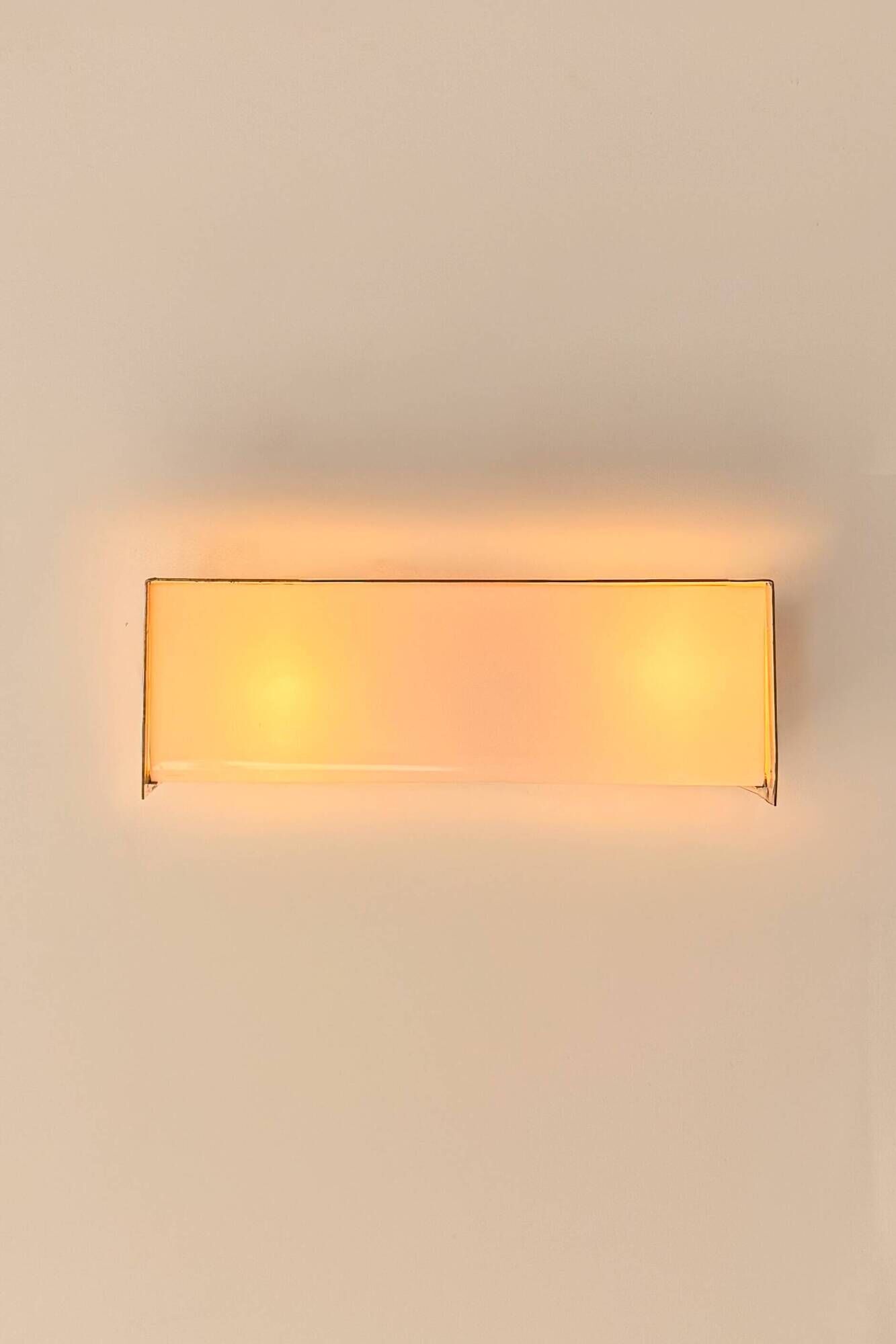 Vintage brass and Perspex wall light, France 1960.