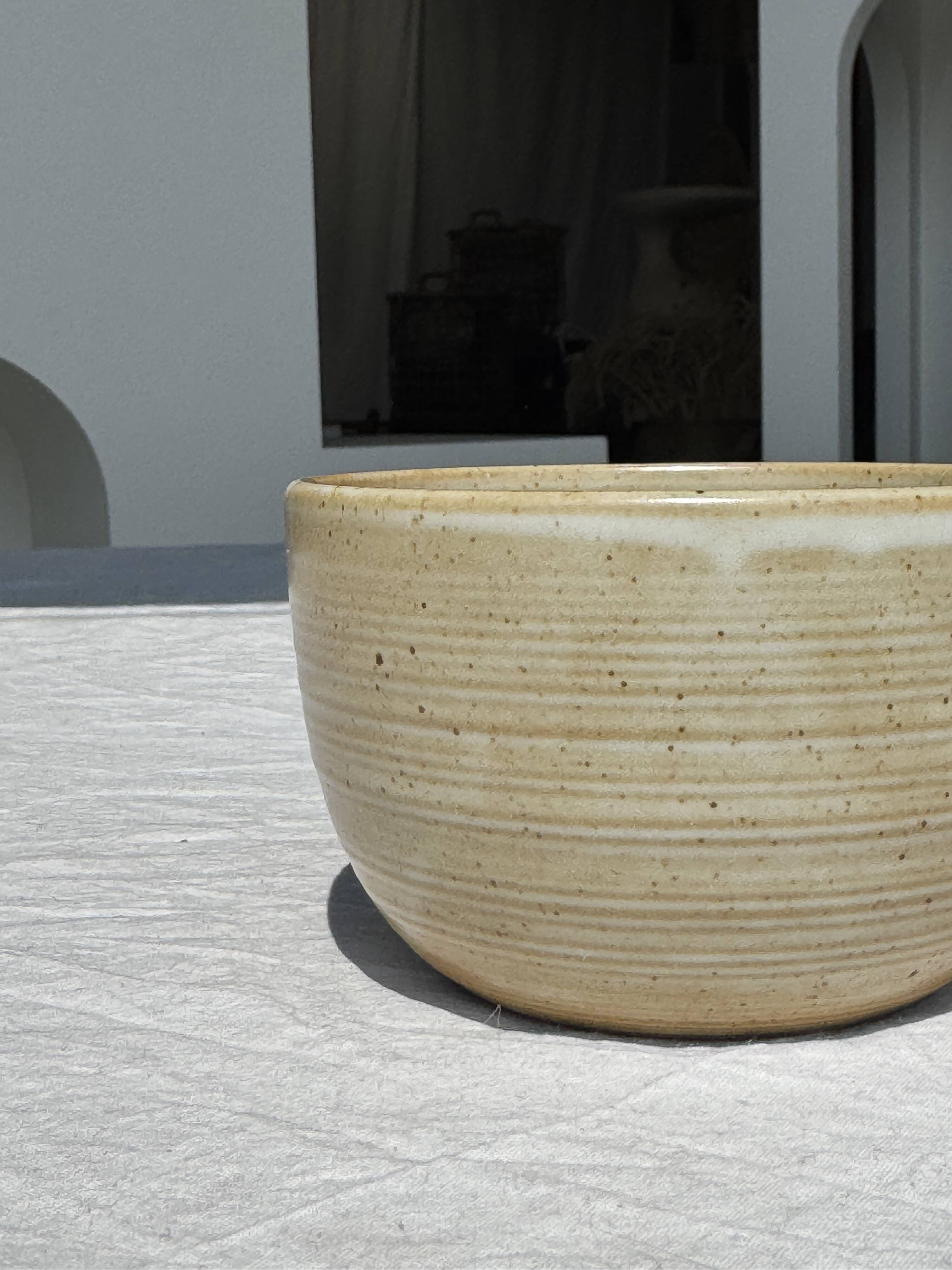 A small tall beige bowl CNP Grès Village France vintage D12