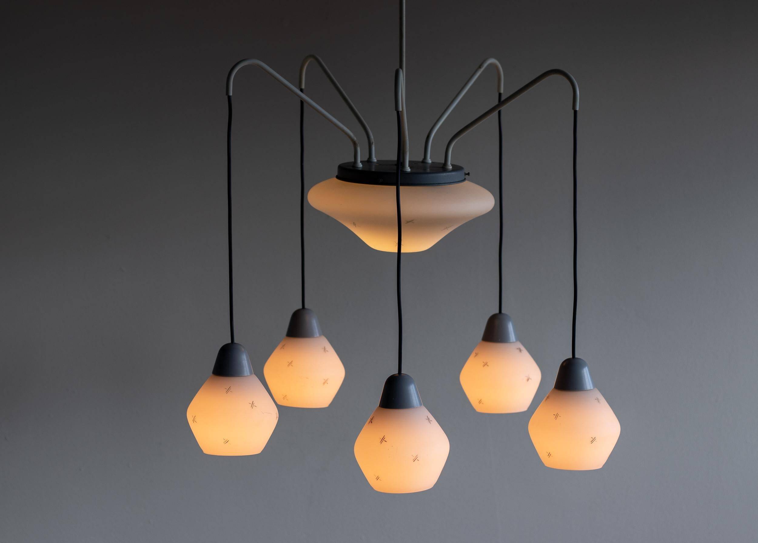 Italian brass enamelled grey chandelier with frosted glass pendants, circa 1960.
