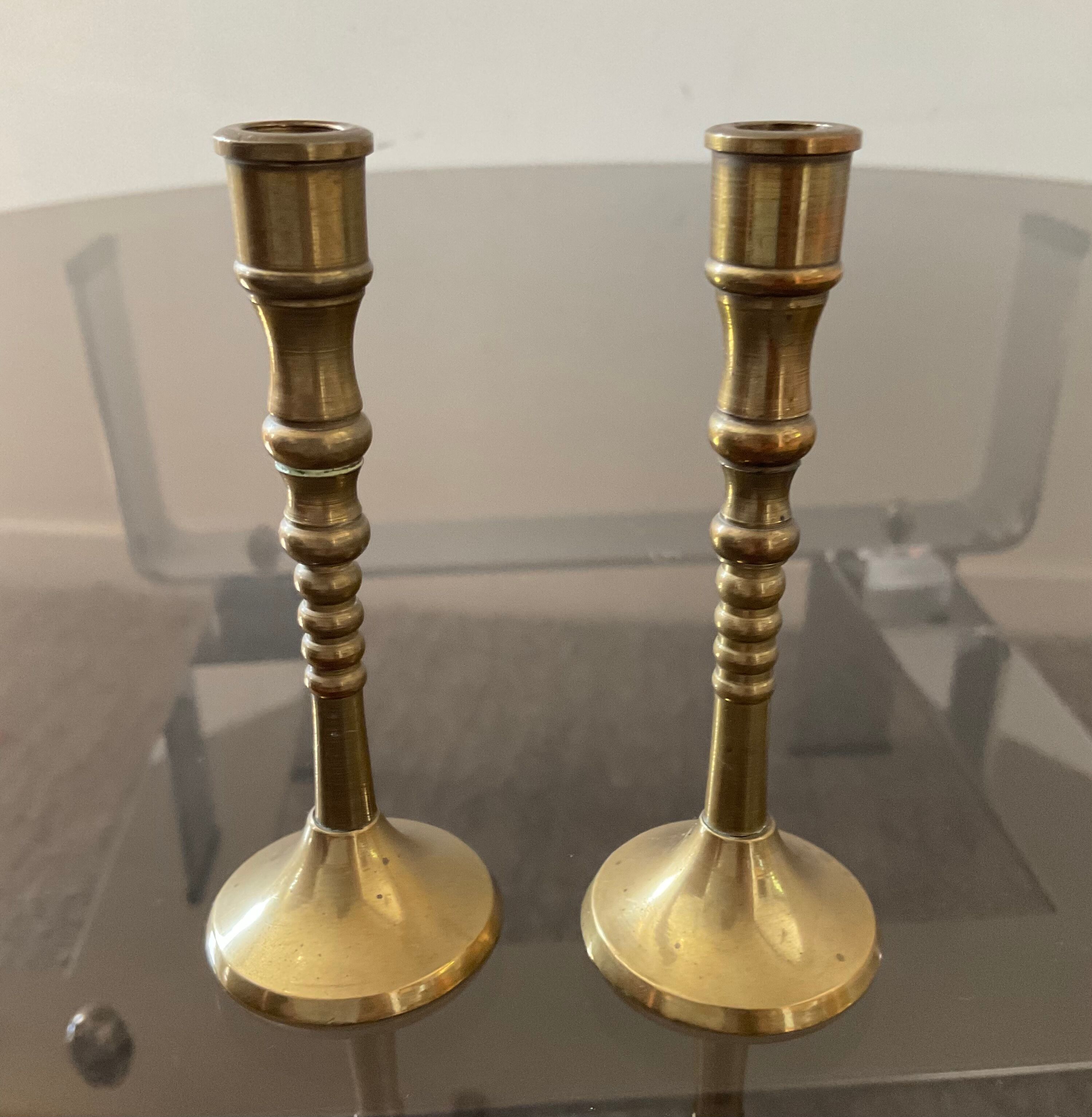 Pair of miniature bronze torches