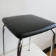 Vintage stool in chrome metal and black skai
