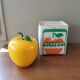 Vintage ice bucket shape yellow apple in its packaging