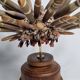 Antique sea urchin pencil on turned wooden base, 22 cm