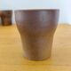 Stoneware cups – Armor stoneware set of 10 and an 11th French stoneware cup.