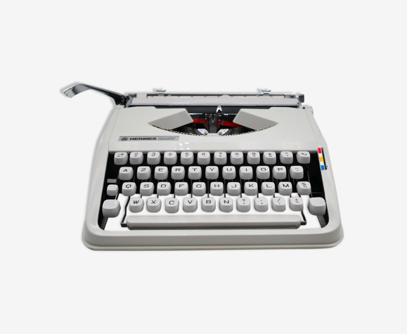 Machine à écrire Hermes Baby blanche cursive révisée ruban neuf Mint