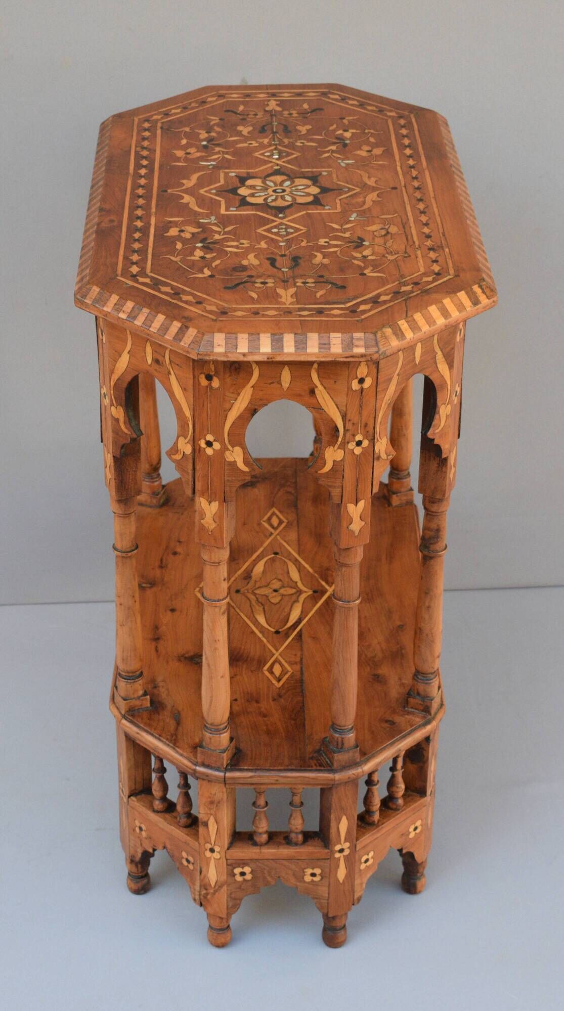 Oriental pedestal table in hexagonal shape made of cedar wood and marquetry