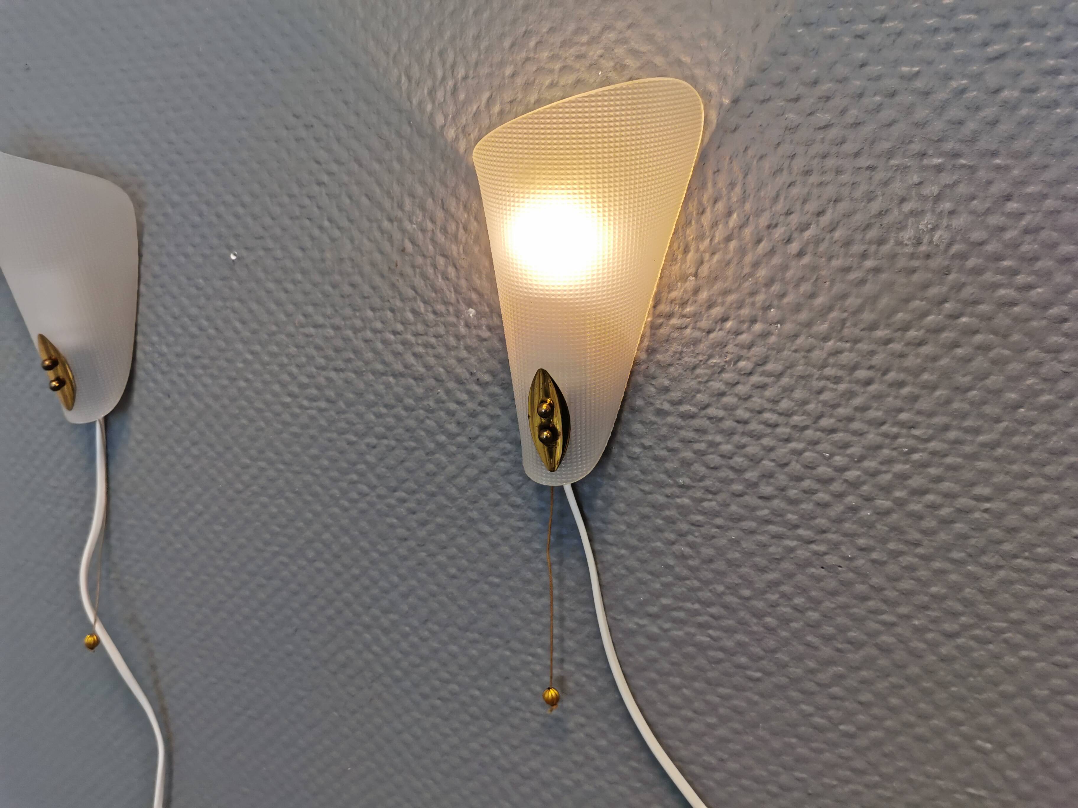 Two small Art Deco wall lights.