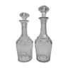 Set of two carved crystal decanters, 24 cm