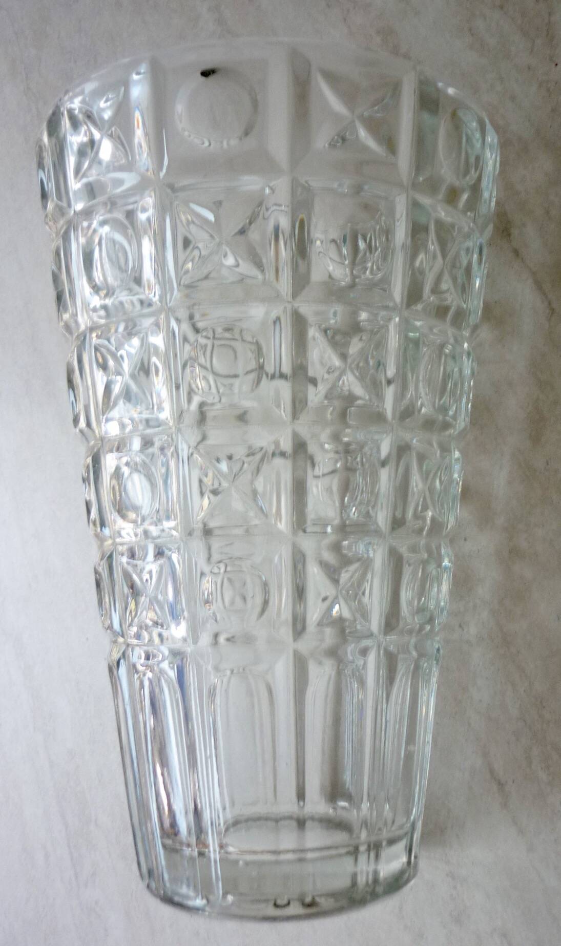 Transparent glass vase with art deco geometric patterns