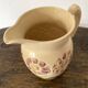 Flower-patterned earthenware pitcher