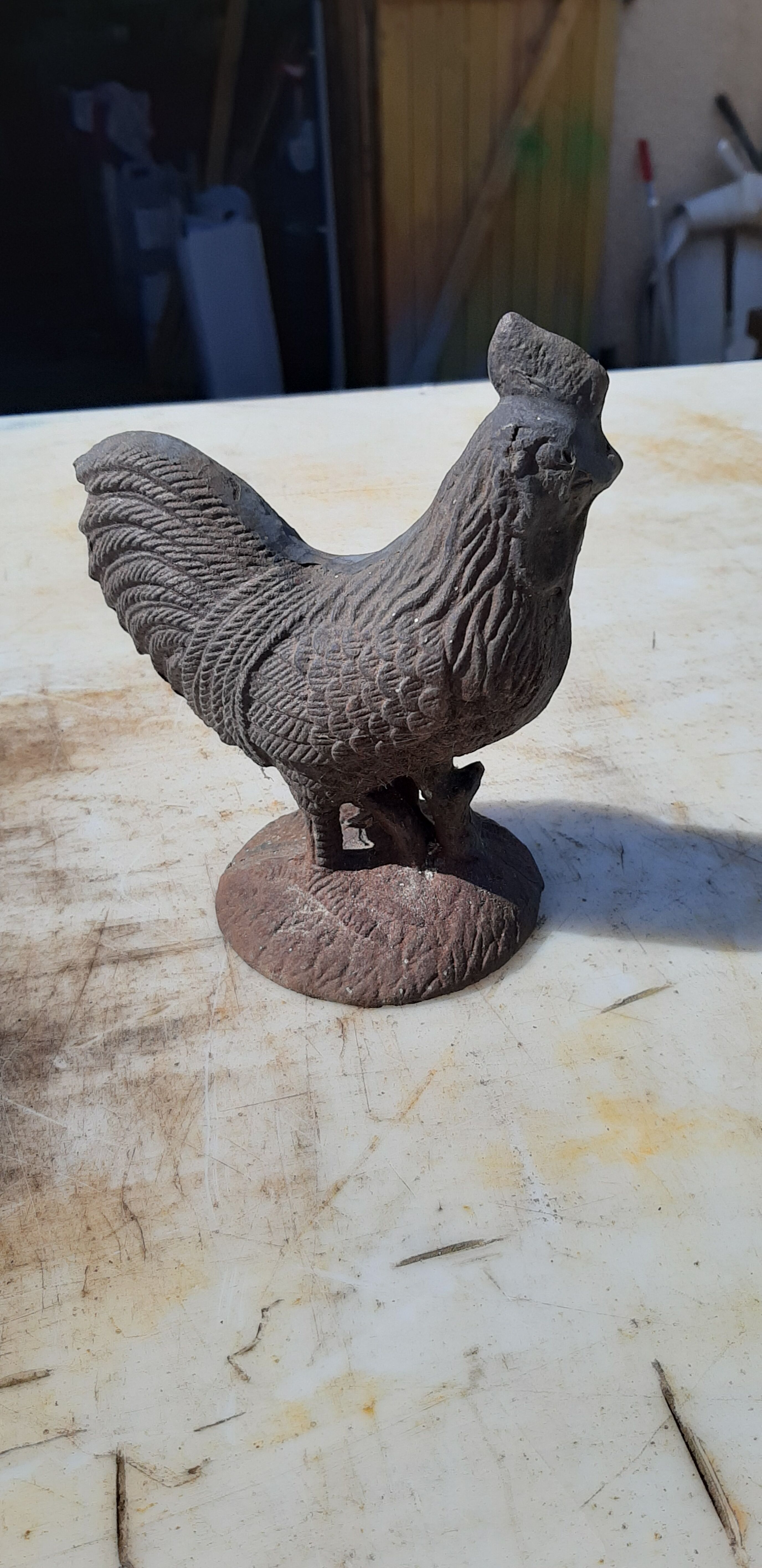 2 roosters and 2 cast iron birds