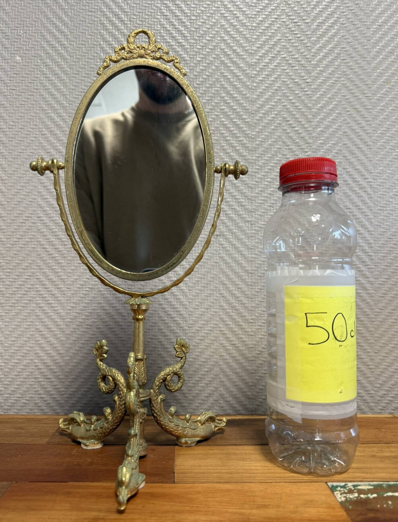 Empire style table mirror in gilded bronze