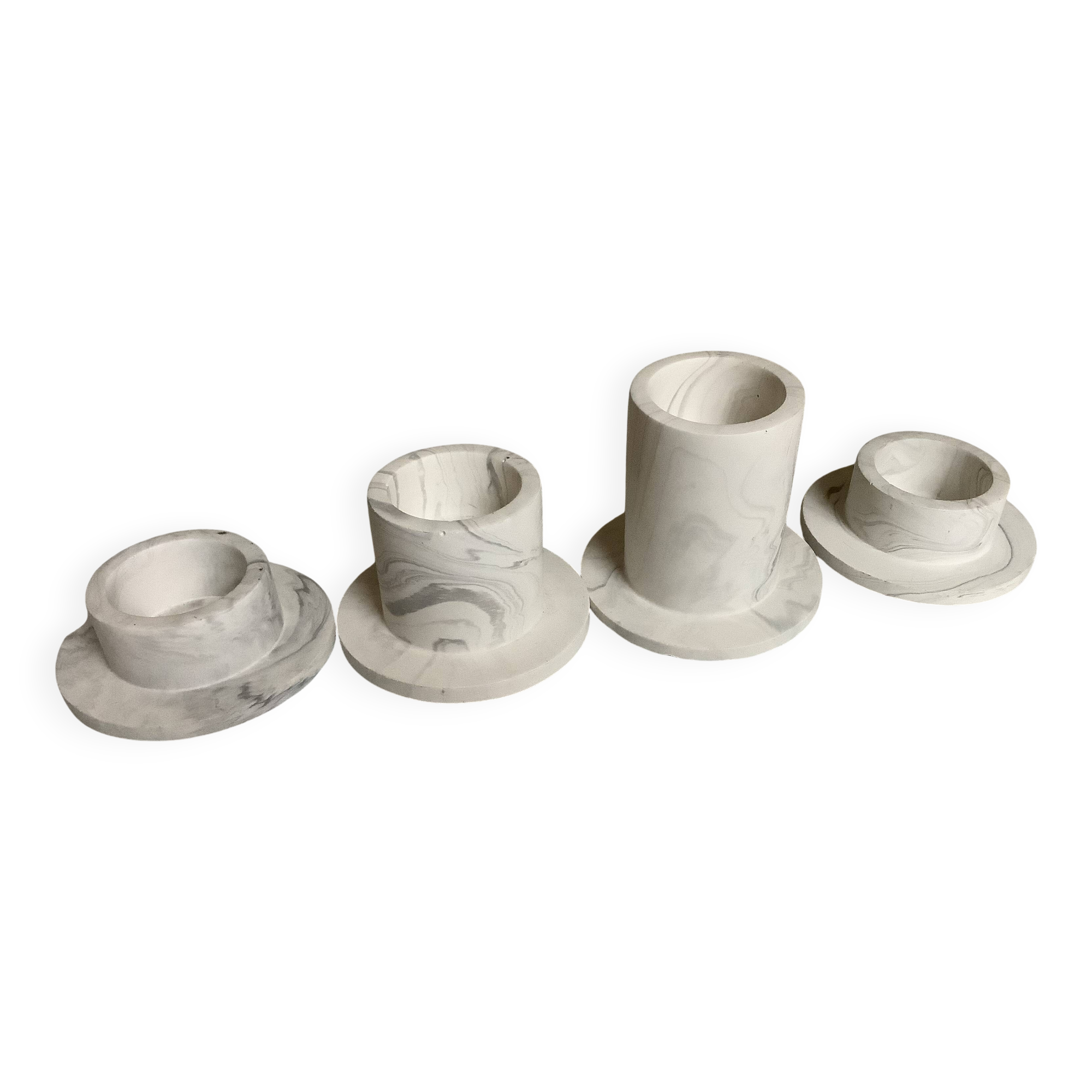Four gypsum composite candle holders