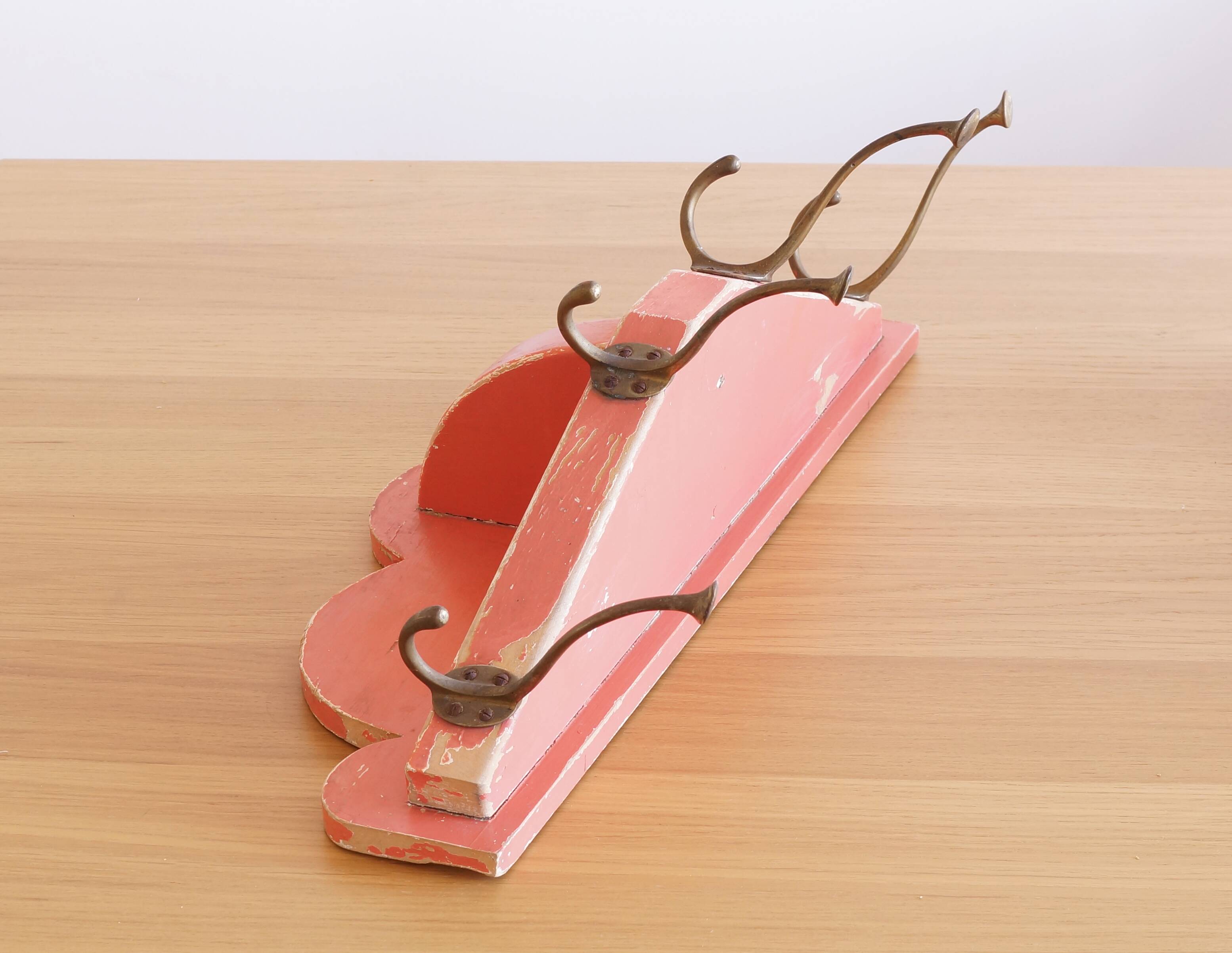 Coat rack in painted wood and vintage brass