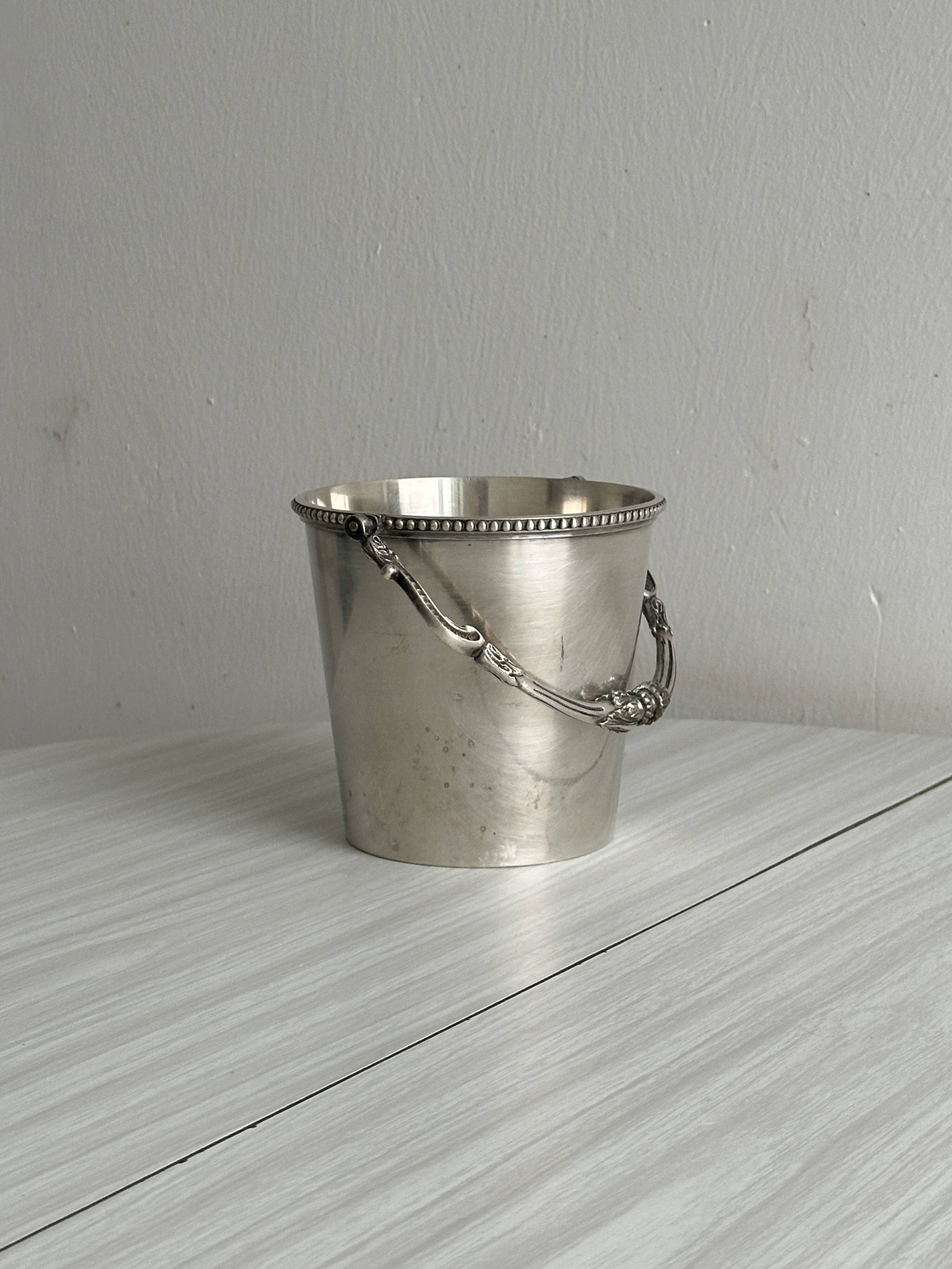 small silver-plated ice bucket