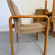 4 armchairs with armrests in beech and fabric, 1970s vintage design.