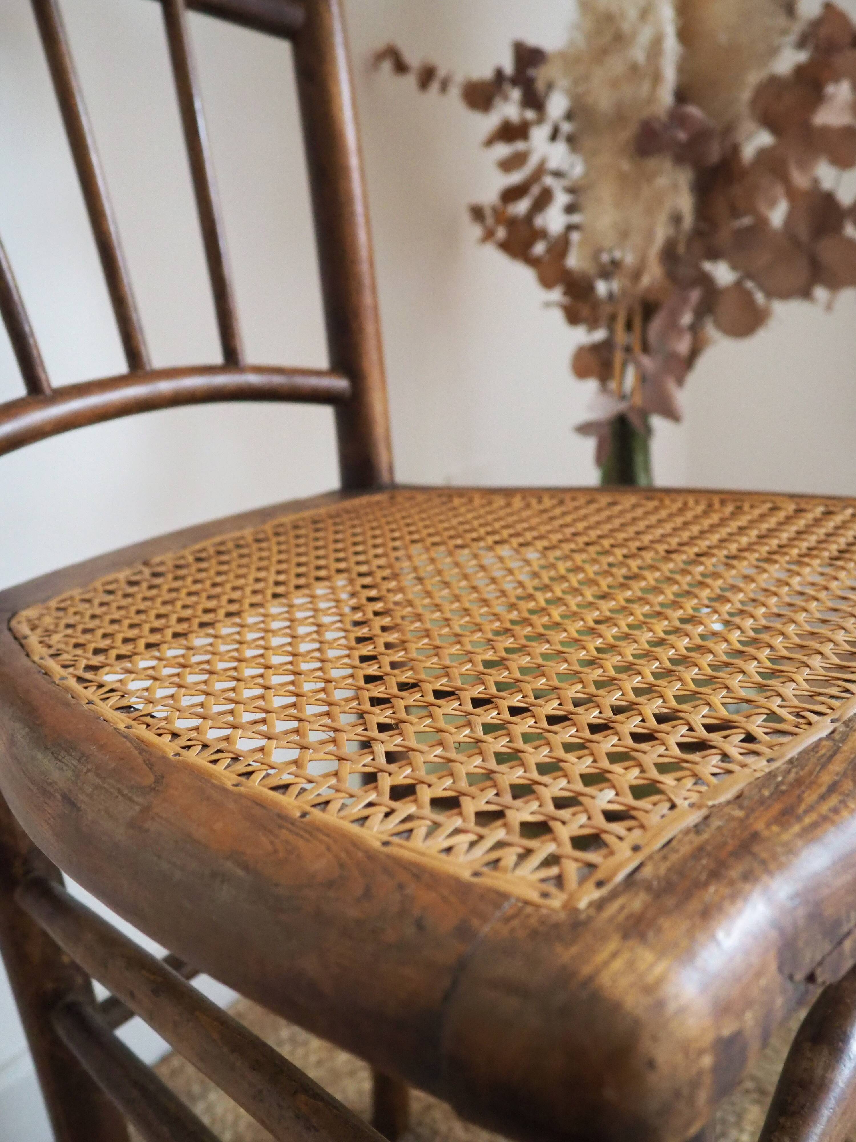 Wooden chair with cane seat