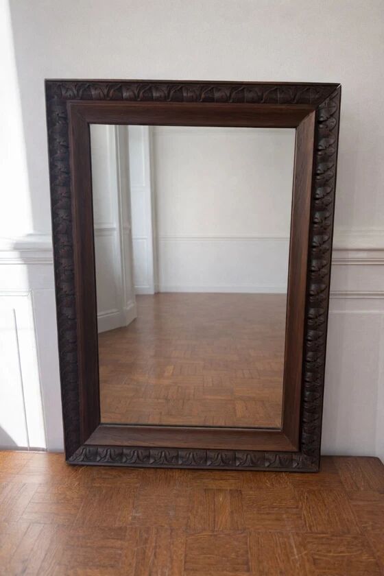 Antique carved wooden mirror
