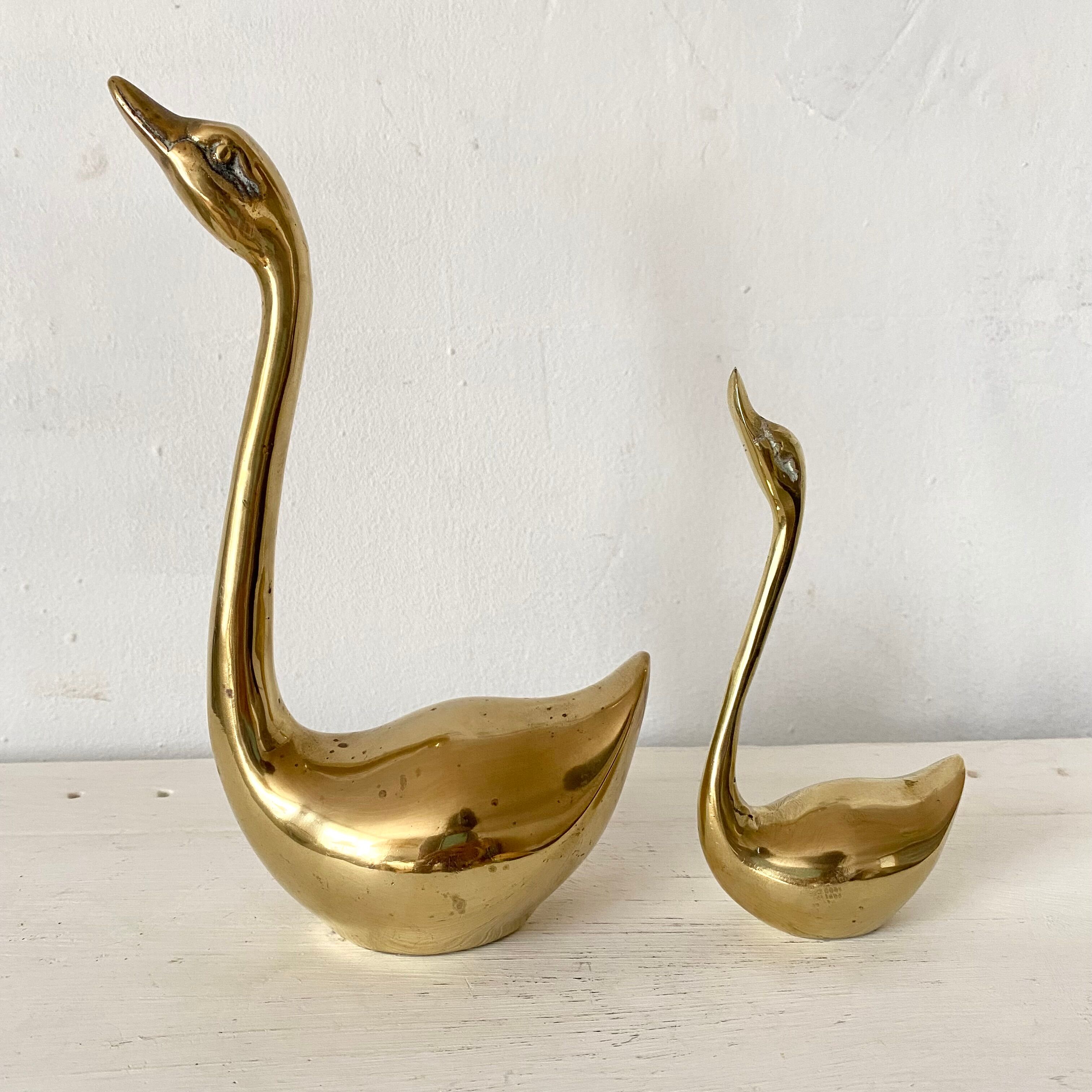 Golden brass birds