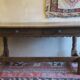 Antique patinated oak dining table, 18th century