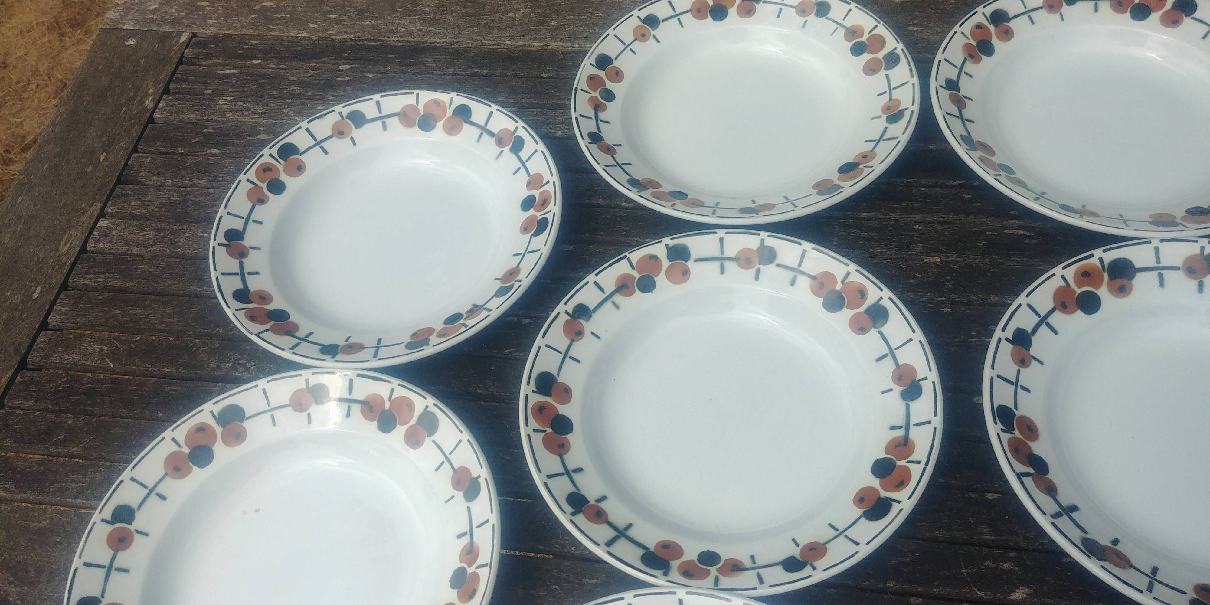 Set of eight ironstone soup plates from the Saint Amand earthenware factory