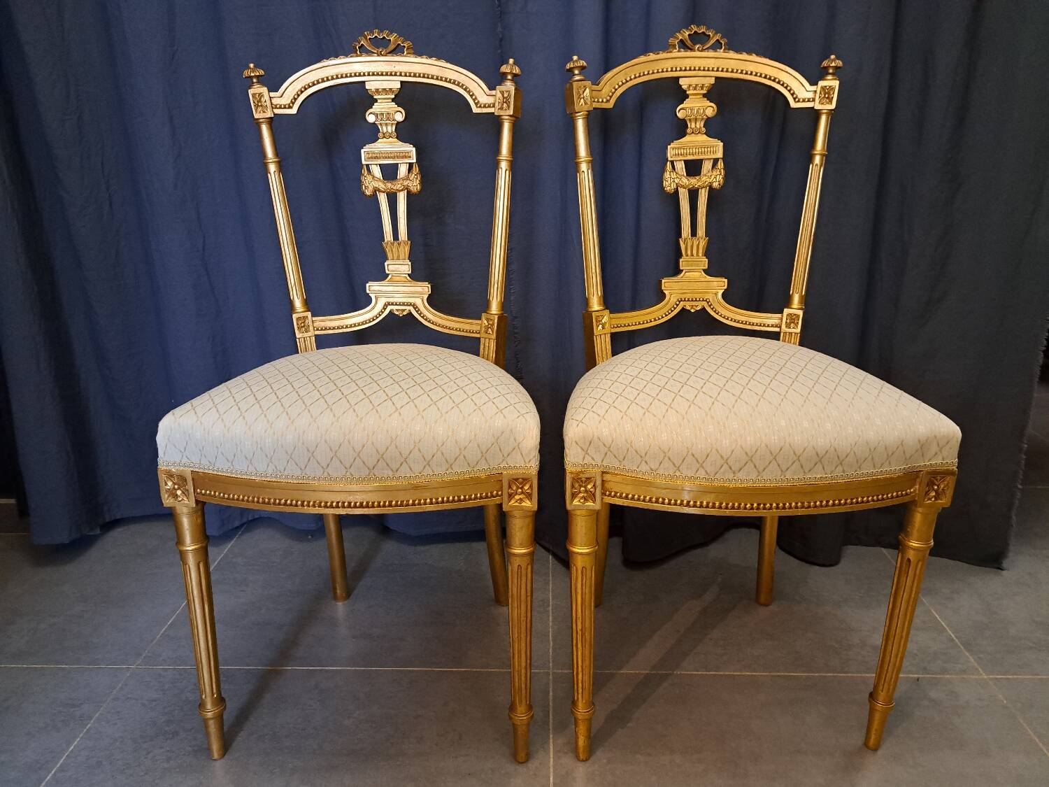 Pair of Napoleon III chairs in gilded wood