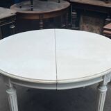 Louis XVI style table with extendable element.