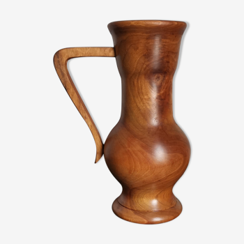Pitcher in olive wood turned in the mass