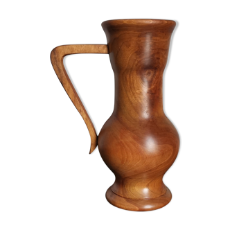Pitcher in olive wood turned in the mass