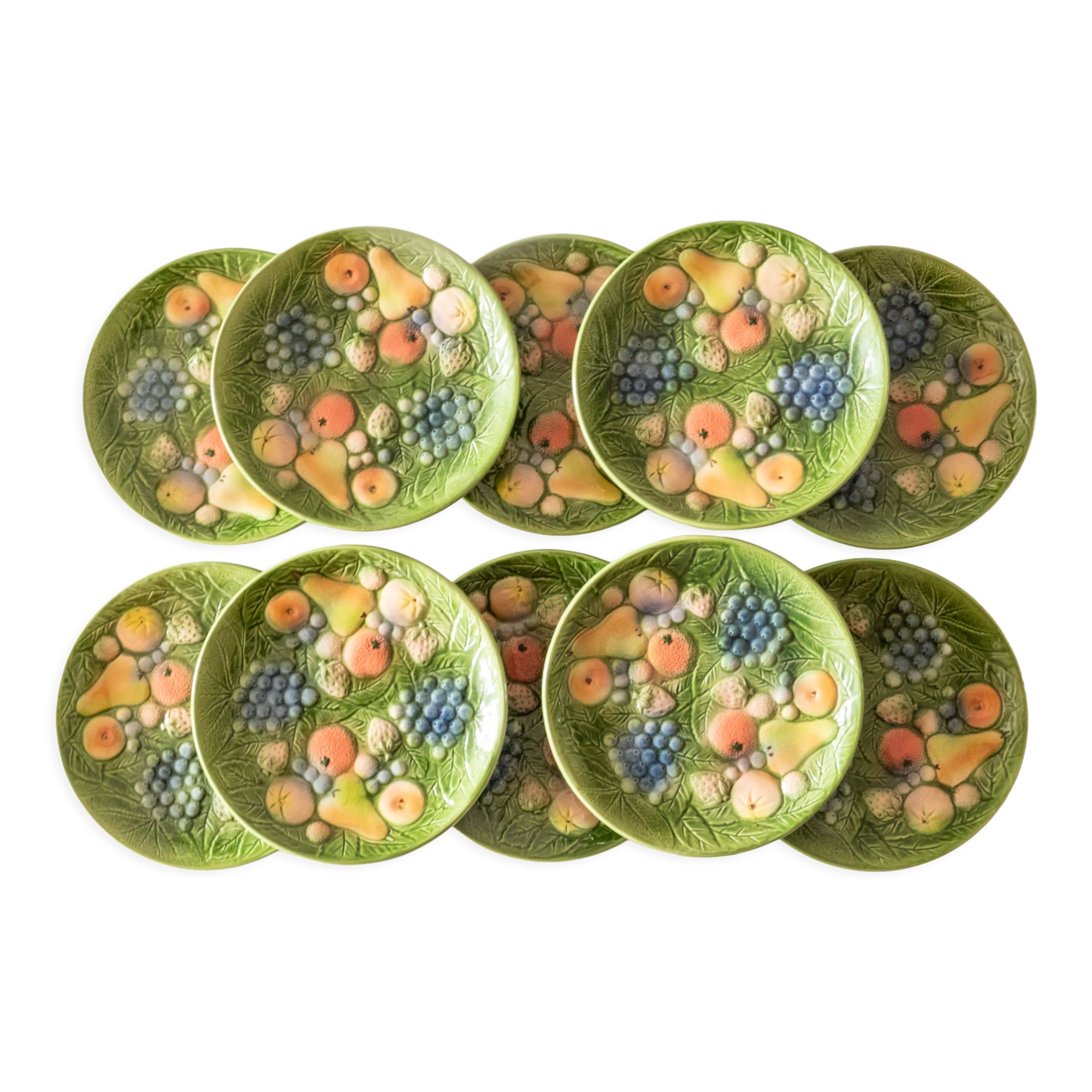 10 antique plates in fruit slip