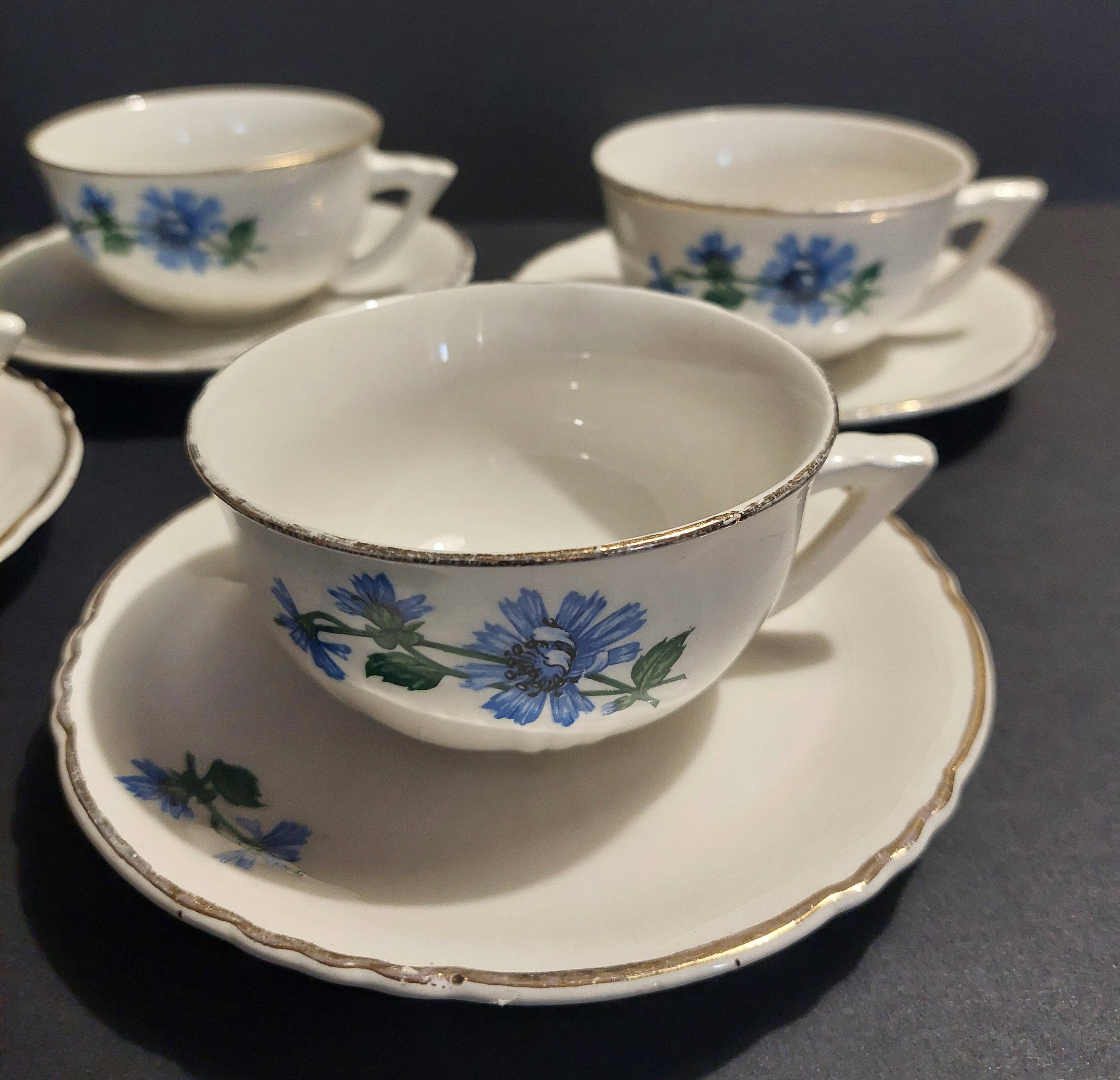 Series of four Orchies earthenware cups with chicory flower decoration