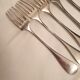 10 mismatched silver metal forks