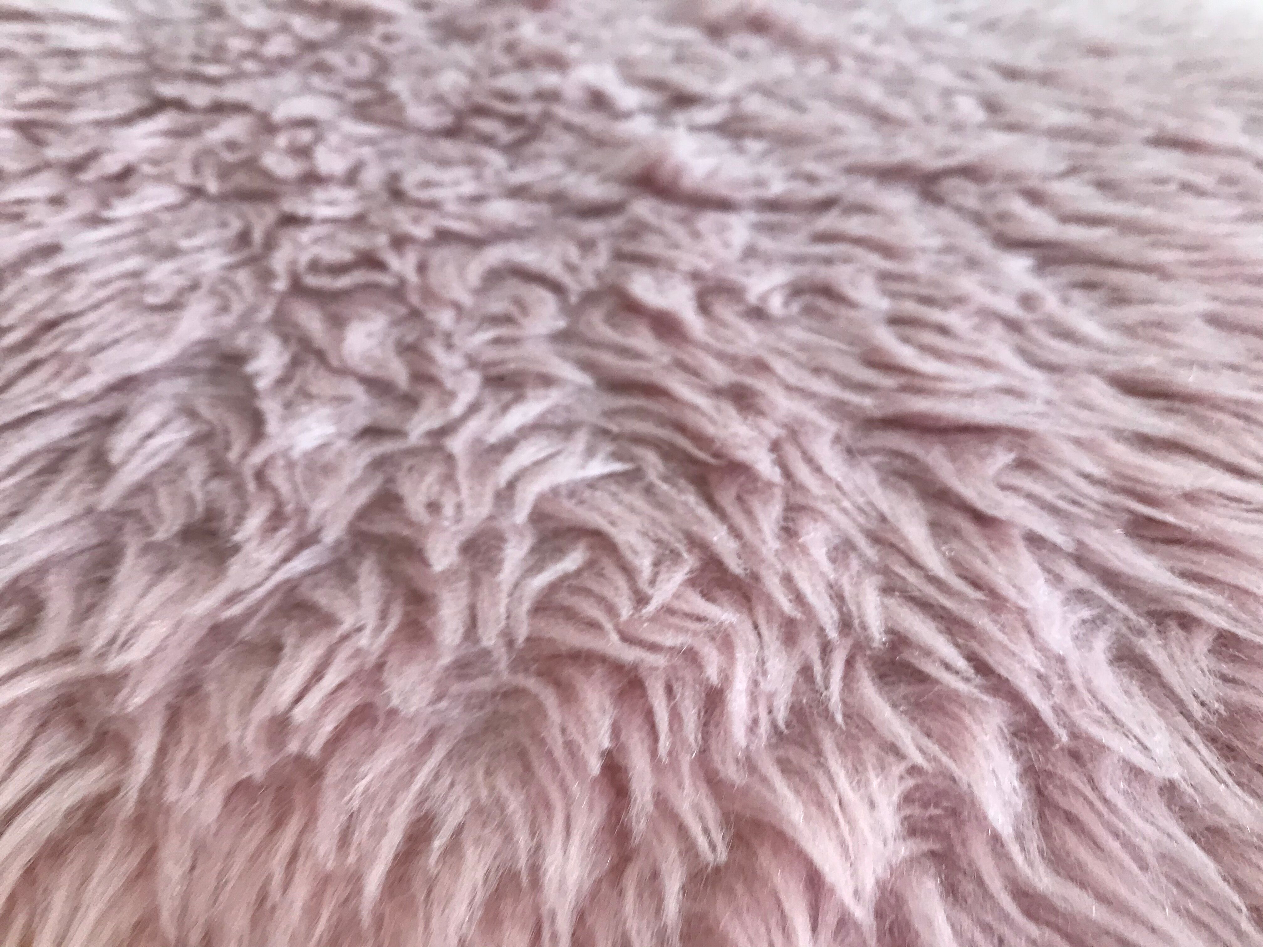 Pelfran rose moumoute chair