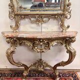 Important console table with a curved shape + Louis XV style mirror in gilded and silvered wood.