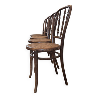 Set of 4 chairs signed Thonet with caning