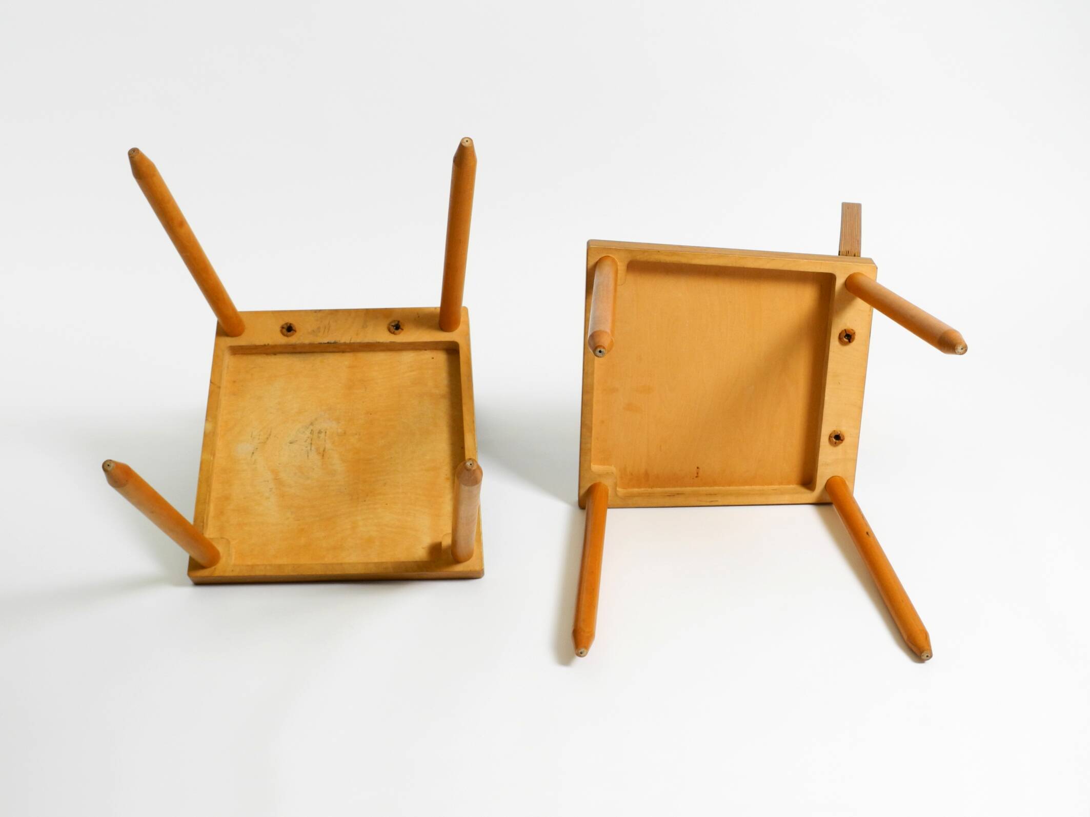 Two rare demountable plywood chairs by Axel Kufus model Stöcke for Atoll