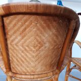 Pair of armchairs in braided rattan 70s