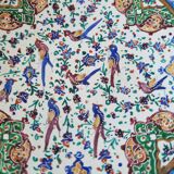 Plate and two decorative saucers enamelled with Persia decoration, circa 1940