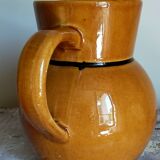 Yellow Provencal ceramic water pitcher with black net