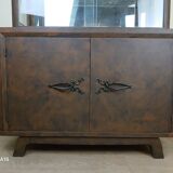 Art Deco period bookcase in lacquered wood with a faux appearance of rust-patinated sheet metal circa 1930-1940