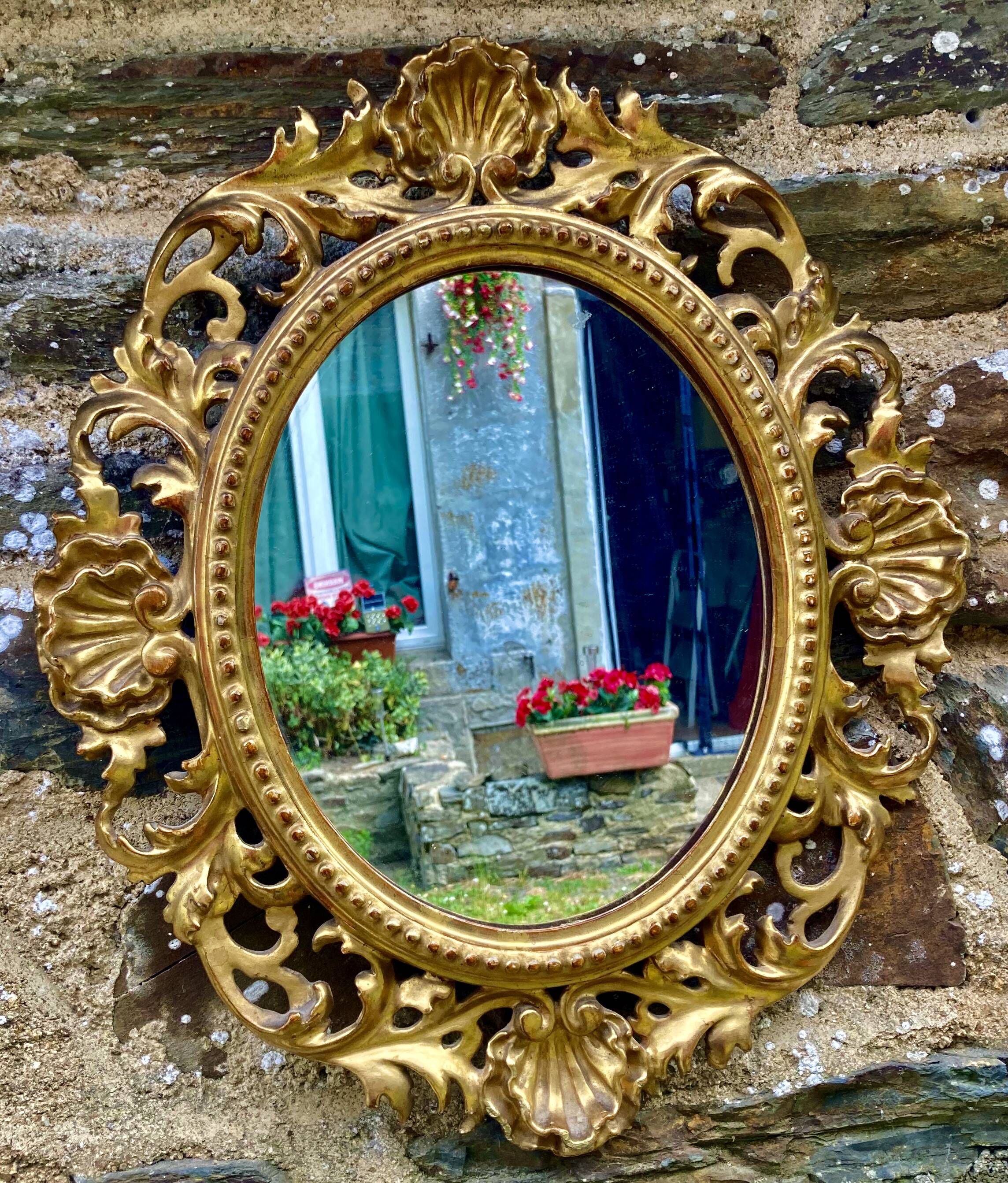 Mirror in carved wood gilded with leaf, Louis XV period, 18th century