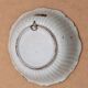 Shallow flat dish in Nevers faience from the 18th century.