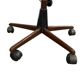 Brown vintage office chair from the 70s on wheels.