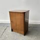 A vintage 1950/60s petite compact oak bedside cabinet