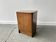 A vintage 1950/60s petite compact oak bedside cabinet