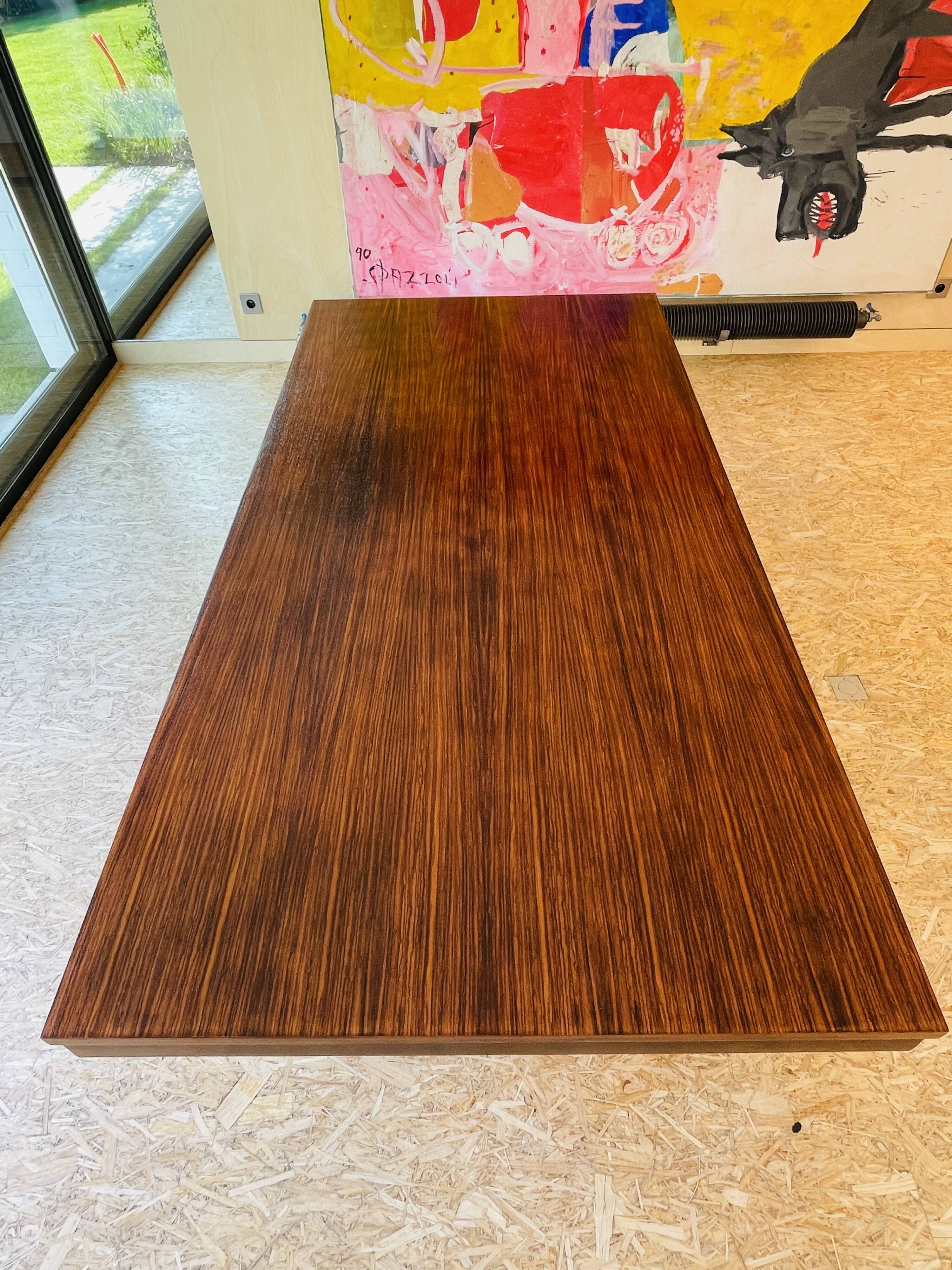 Desk that can serve as a dining table.