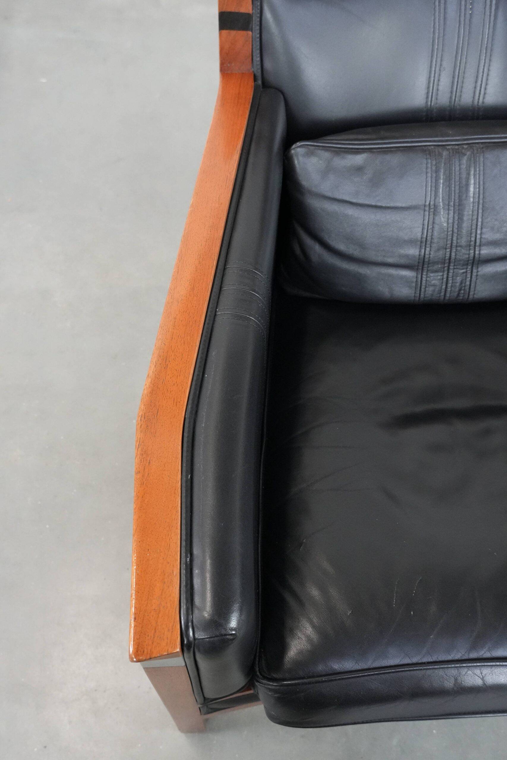 Fauteuil Art Déco en cuir noir et bois