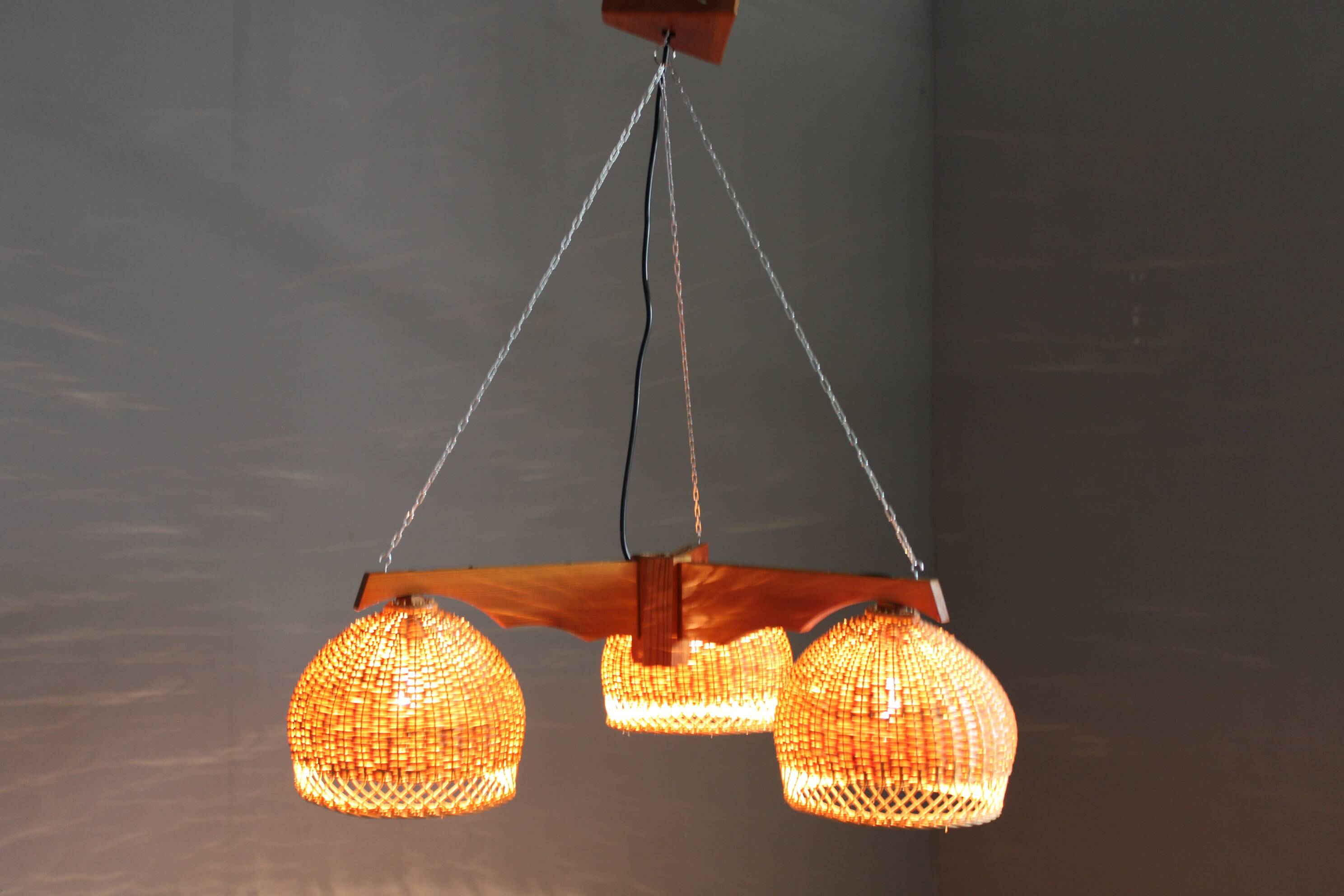 1970s Czechoslovakian rattan & pine pendant light, three-shade chandelier