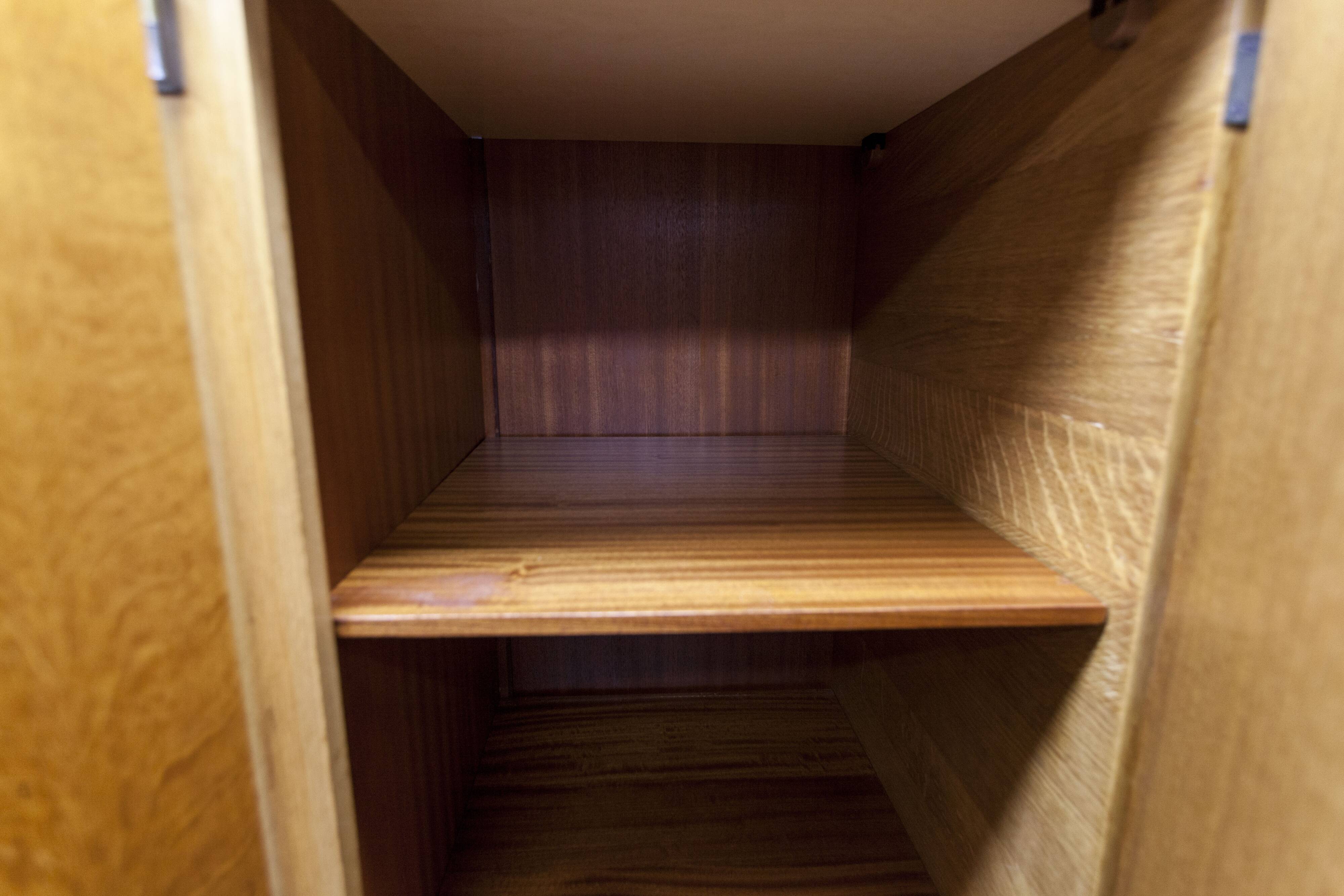 French wardrobe with tapered legs, 3 doors, 1 mirror (27*130), and 1 drawer.