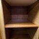 French wardrobe with tapered legs, 3 doors, 1 mirror (27*130), and 1 drawer.